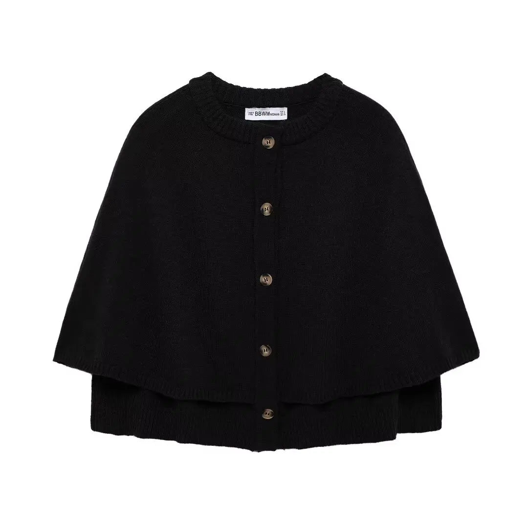 Stickad poncho