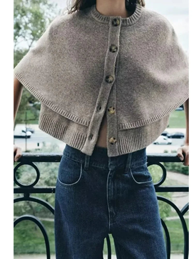 Stickad poncho
