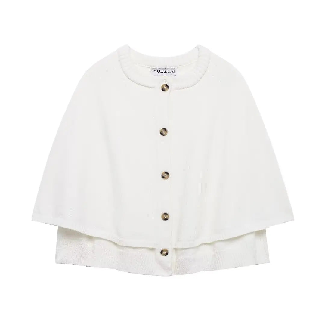 Stickad poncho