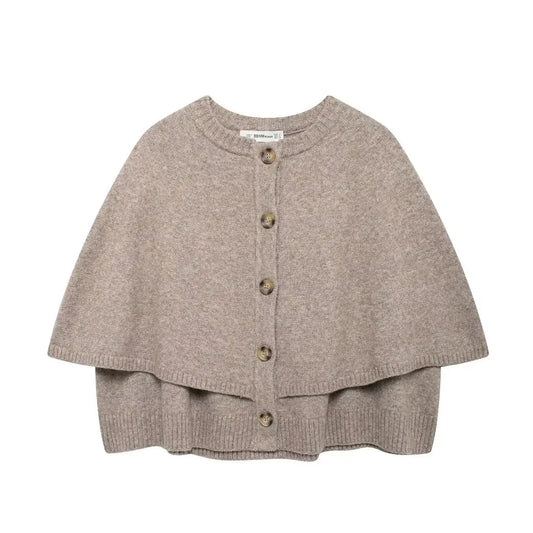 Stickad poncho