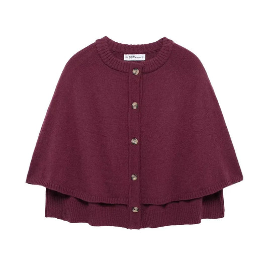 Stickad poncho